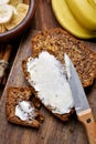 Butter on slice of banana bread Royalty Free Stock Photo