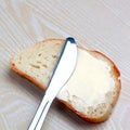 Butter on a slice of bread Royalty Free Stock Photo