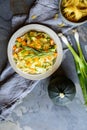 Butter squash pasta salad with zucchini slices, cheddar cheese and scallion