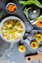 Butter squash pasta salad with zucchini slices, cheddar cheese and scallion