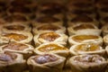 Butter tarts, small size, for sale on the shelf of a Canadian Market of Toronto. Butter tart is symbol of canadian cuisine