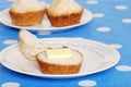 Butter on a tea biscuit Royalty Free Stock Photo