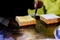 Butter toast cooking on hot pan Royalty Free Stock Photo