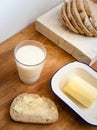 Buttered bread with glass of milk