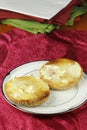 Buttered Everything Bagel on a Plate over a Placemat Royalty Free Stock Photo