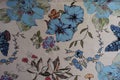 Butterflies, flowers and leaves printed on fabric