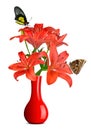 Butterflies sitting on lily in red vase Royalty Free Stock Photo