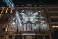 Butterfly light show by Dominic Harris on facade of the Halcyon Gallery, London, UK