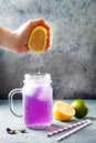 Butterfly pea flower blue iced tea or lemonade. Healthy detox herbal drink.