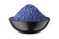 Butterfly pea flower powder or blue matcha in round bowl isolated on white. Front view Royalty Free Stock Photo