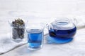 Butterfly pea flower tea is brewed in a glass teapot and served into a transparent cup. Blue herbal tea Royalty Free Stock Photo