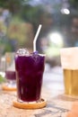 Butterfly pea juice with lemon in cold glass Royalty Free Stock Photo