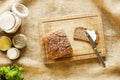 Buttering a slice of bread vivid kitchen scene