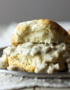 Buttermilk biscuit with sausage gravy, close view. Royalty Free Stock Photo