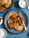 Buttermilk pancake with roasted honey cinnamon apples. Delicious Breakfast on a wooden table Royalty Free Stock Photo