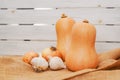 Butternut squash, galic, and onion close-up on a rustic background