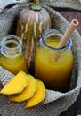 Butternut squash milk bottle, yellow healthy, nutritious drink for breakfast Royalty Free Stock Photo