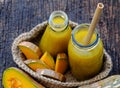 Butternut squash milk bottle, yellow healthy, nutritious drink for breakfast Royalty Free Stock Photo