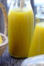 Butternut squash milk bottle, yellow healthy, nutritious drink for breakfast Royalty Free Stock Photo