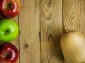 Butternut Squash Pumpkin Ripe Red Green Apple on Weathered Wood Background. Autumn Fall Thanksgiving Harvest. Copy Space Royalty Free Stock Photo