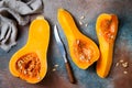 Butternut squash on rustic background. Healthy fall cooking concept.