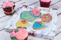 Buttery cookie, decorated with rolling fondant and royal icing. Surrounded by cupcakes and cookies. Written in Portuguese mother, Royalty Free Stock Photo