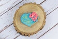 Buttery cookie, decorated with rolling fondant and royal icing. on a wooden trunk board top view Royalty Free Stock Photo