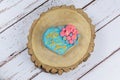 Buttery cookie, decorated with rolling fondant and royal icing. on a wooden trunk board. Written in Portuguese mother, I love you Royalty Free Stock Photo