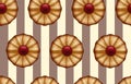 Buttery cookies with red jam on striped brown and beige, like a cocoa and vanilla color seamless background