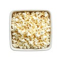 Buttery Popcorn in a White Square Bowl against Black Background Royalty Free Stock Photo