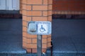 Button for calling staff to help people with disabilities and wheelchairs. Translation:Call staff Royalty Free Stock Photo