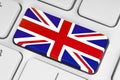 Button with Great Britain flag on white computer keyboard Royalty Free Stock Photo