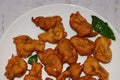 Button mushroom fritters, pakora or pakoda, Indian food