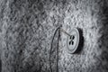 Button on thick coat fabric and thread with needle on it Royalty Free Stock Photo