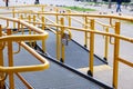 A button to call for help. A ramp for the disabled. The specific path of the ramp with stainless steel handrail. Sign for disabled Royalty Free Stock Photo