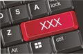 Button with xxx letters Royalty Free Stock Photo