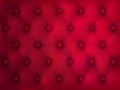 Buttoned leather background, red quilted fabric
