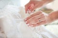 Buttoning wedding dress Royalty Free Stock Photo