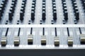 Buttons of auido mixer board, warm tone Royalty Free Stock Photo