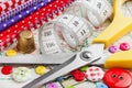 Buttons, colorful fabrics, scissors, measuring tape Royalty Free Stock Photo