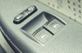 Buttons controlling windows in car. Car window switch Royalty Free Stock Photo