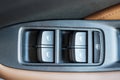 Buttons controlling the windows inside a car, control and electric mirror adjustment Royalty Free Stock Photo