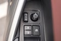 Buttons controlling the windows inside a car, control and electric mirror adjustment Royalty Free Stock Photo