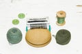 buttons, darning machine, thread on an old painted wooden surfac Royalty Free Stock Photo