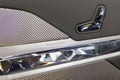 Buttons and elements on the door of a bright interior interior of a luxury Mercedes-Benz S-Class w223.