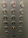 Buttons in the elevator of a twelve-story building. Row of buttons