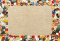 Buttons frame on fabric background