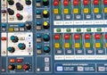 Buttons and knobs on stereo audio mixer