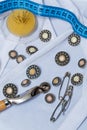 Buttons, pins, needles, measuring tape. Needlework. Royalty Free Stock Photo