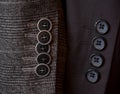 Buttons on a sleeve of a man`s suit